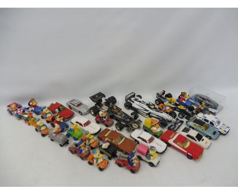 A collection in two trays of playworn die-cast models to include TV related, various makers including Corgi and Dinky.