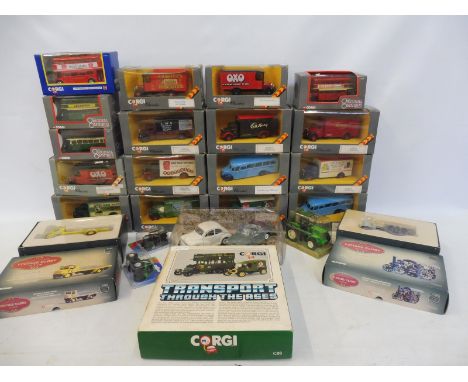 A collection of boxed Corgi Classics, various vans, plus other boxed models.