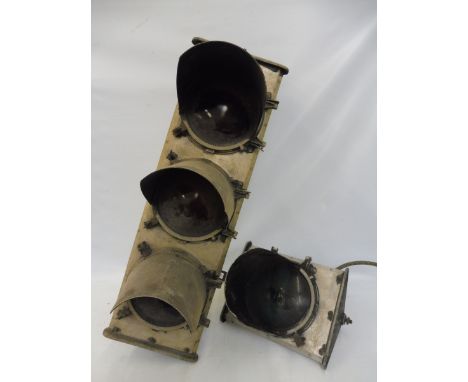 A set of circa 1950s traffic lights, plus one additional light with green lens, for restoration, the largest set 37 1/2" long