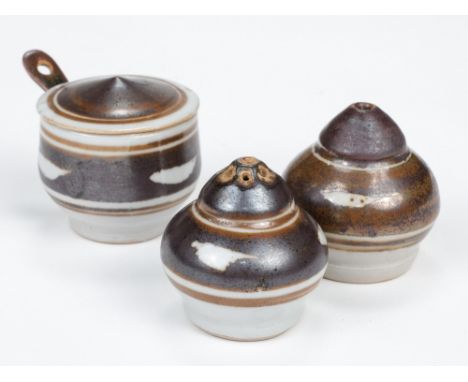 * Davis (Harry, 1910-1986) and Davis (May, 1914-1998). A cruet set for Crowan Pottery, comprising a salt pot, pepper pot and 