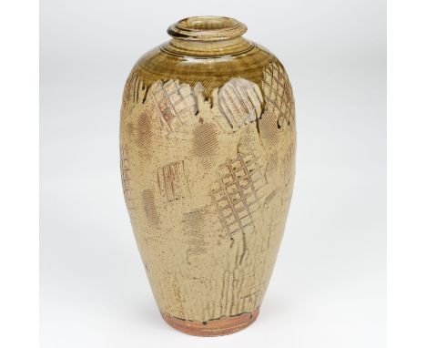 AR  * Dodd (Mike, 1943-). A large stoneware bottle vase, covered in a green ash glaze, running over the shoulders, impressed 