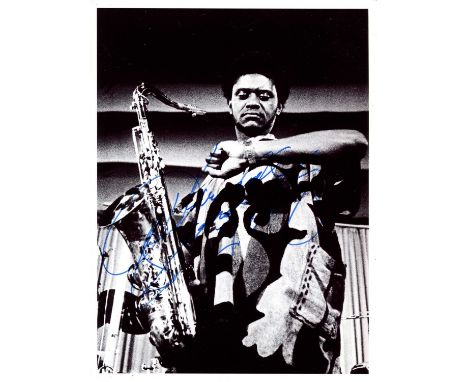 SANDERS PHAROAH: (1940-2022) American jazz saxophonist. Signed 8 x 10 photograph of Sanders standing in a three-quarter lengt
