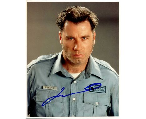 TRAVOLTA JOHN: (1954- ) American actor. Signed colour 8 x 10 photograph of the actor in a head and shoulders pose, wearing hi