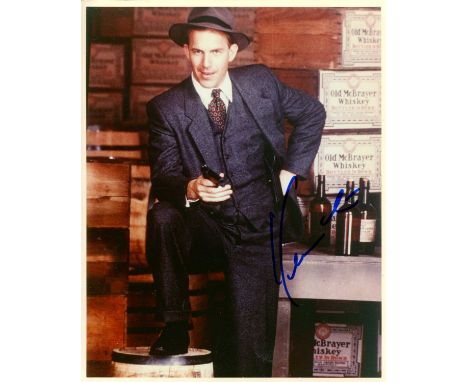 COSTNER KEVIN: (1955- ) American actor, Academy Award winner. Signed colour 8 x 10 photograph of Costner standing in a full-l
