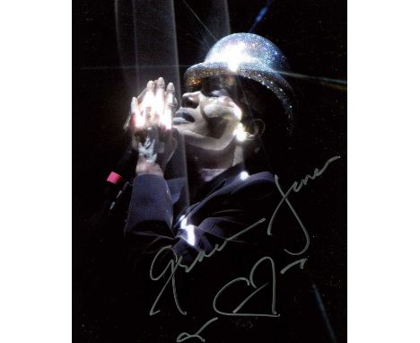 JONES GRACE: (1948- ) Jamaican-American model, singer &amp; actress. Signed colour 8 x 10 photograph of Jones, the unusual an