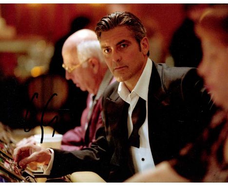 CLOONEY GEORGE: (1961- ) American actor, Academy Award winner for Best Supporting Actor in 2005 for his role as Bob Barnes in