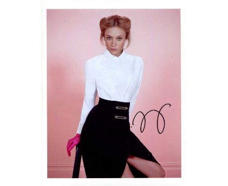 SEVIGNY CHLOE: (1974- ) American actress. Signed colour 8 x 10 photograph of Sevigny seated on a stool in an alluring three-q