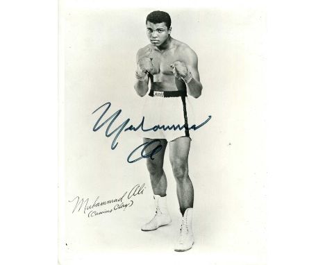ALI MUHAMMAD: (1942-2016) American boxer, World Heavyweight Champion. A good signed 8 x 10 photograph of Ali standing in a fu