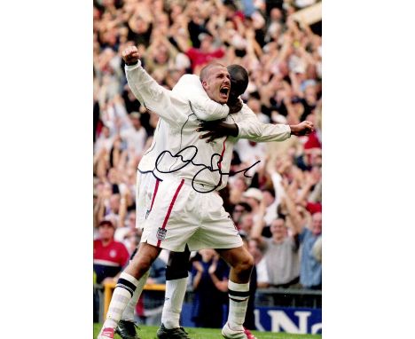 BECKHAM DAVID: (1975- ) English Footballer. Signed colour 8 x 12 photograph by Beckham, the image showing him in a full-lengt