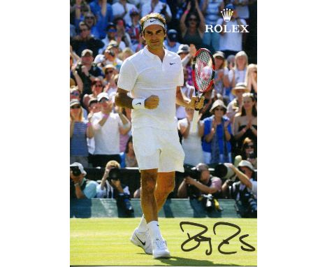 FEDERER ROGER: (1981- ) Swiss Tennis Player, winner of twenty Grand Slam singles titles and widely considered one of the grea