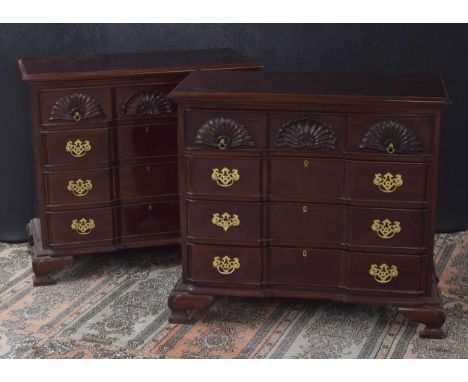 Pair of Chippendale style chest of drawers, each with shell carved top drawers, over three further drawers upon ogee bracket 