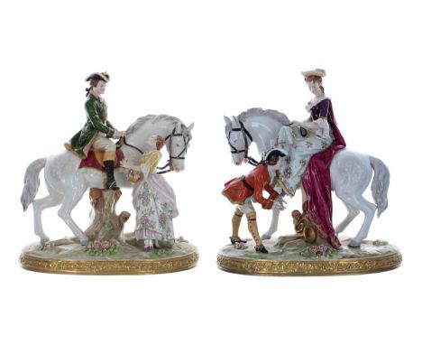 Good pair of large Sitzendorf porcelain equestrian figural groups, a man in a green frock coat seated on a horse, and a lady 