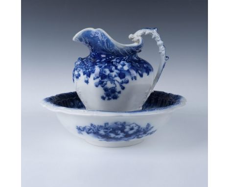 Decorated with beautiful blue floral patterns and stylized foliage in low-relief. Johnson Brothers backstamp. Pitcher: 7.75"L