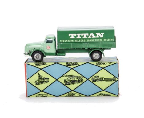 A Tekno 438 Volvo Covered Lorry 'Titan', light/dark green cab and body, green tinplate tilt, bare metal hubs, in original box