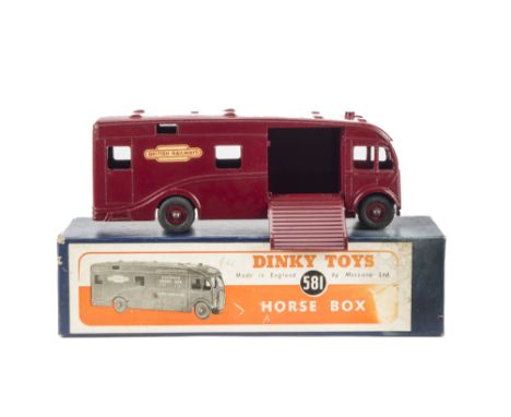 A Dinky Toys 581 Express Horsebox 'British Railways', maroon body and hubs, in original box, VG-E, slight loss to one decal, 