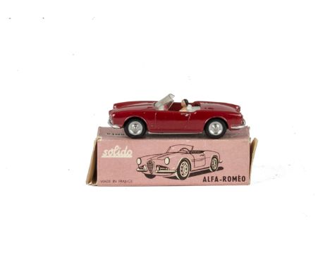A Solido No.106 Alfa-Romeo Giulietta-Spider, dark red body, white interior, female driver figure, spun hubs, in original box,