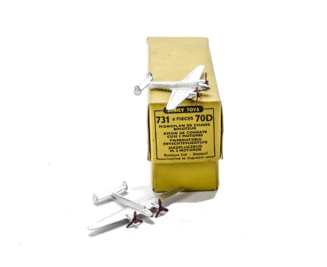 A Dinky Toys 731/70d Twin Engine Fighter Trade Box, containing two examples, both silver with red three blade propellers, E, 