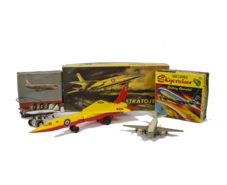 A Marx Toys Friction Drive Plastic Stratojet, yellow/red, Marx tinplate battery-operated Four Engined Skycruiser, 1950s plast