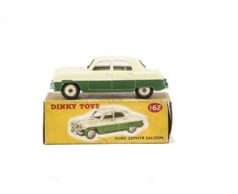 A Dinky Toys 162 Ford Zephyr Saloon, cream upper body, dark green lower, cream ridged hubs, in original box, E, box F, grubby