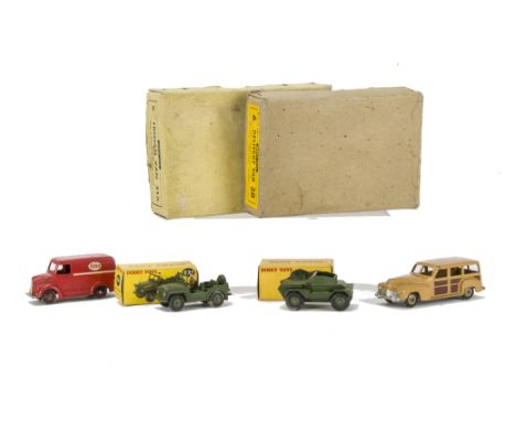 A Dinky Toys 31a Trojan Van Trade Box, containing one 'Esso' example, empty 28 Delivery Van Trade Box, boxed 674 Austin Champ