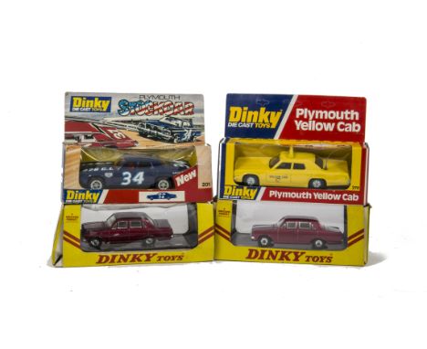 Dinky Toys 151 Vauxhall Victor 101, two examples, both metallic red, brown interior, spun hubs, 278 Plymouth Yellow Cab, 201 