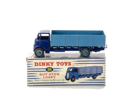 A Dinky Toys 511 Guy 4-Ton Lorry, 1st type violet blue cab/chassis, mid-blue back and grooved hubs, in original box, VG, box 