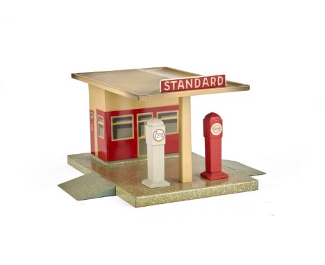 A Scarce Marklin 2620B Tinplate 'Standard' Petrol Station, with 'Esso' and 'Standard' wooden petrol pumps, electric light fit
