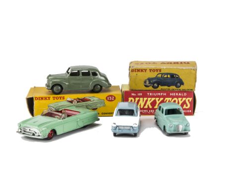 A Dinky Toys 189 Triumph Herald, light blue/white body, spun hubs, VG, 132 Packard Convertible, green body, red interior and 