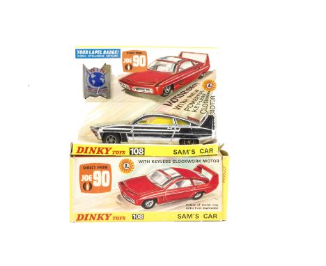 A Dinky Toys 108 Sam's Car From Joe 90, chrome body, lemon interior, in original box with 'WIN' badge, inner stand and instru