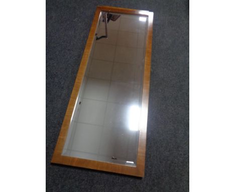 A walnut framed Art Deco bevel edged hall mirror.  