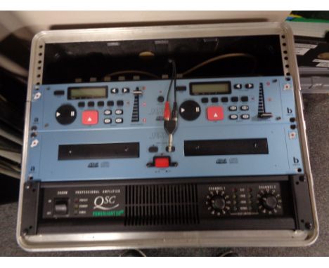 A DJ's flight case containing a QSC Powerlight 20 professional amplifier, a CDG 2120 Jewel G Player together with a control d