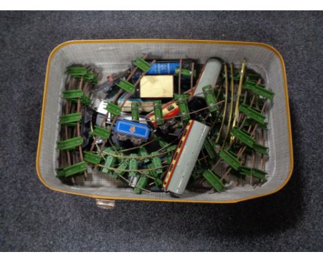 A vintage tin plate train set with Flying Scotsman engine, tender and wagons 