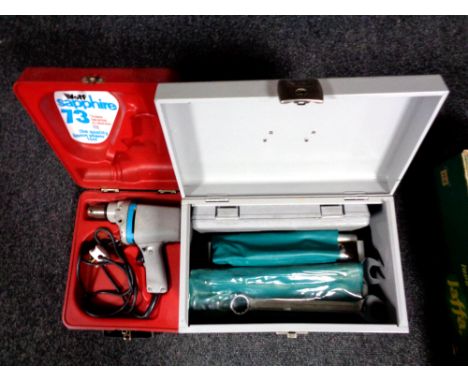 A metal box containing router bits, spanner set, socket set etc, together with a boxed rivet gun