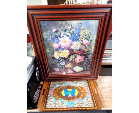 A contemporary fire screen with floral panel on brass feet, together with a Tourist butterfly tray.  
