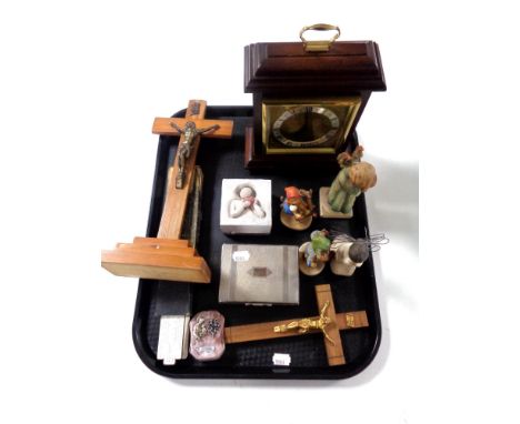 A tray of cased slide rule, Hummel figures, crucifixes, Algeus mantel clock 
