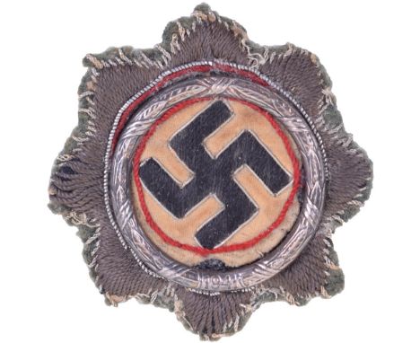 Scarce WW2 Army / Waffen-SS Issue German Cross (Deutsche Kreuz) in Silver Cloth Version, well worn uniform removed example of