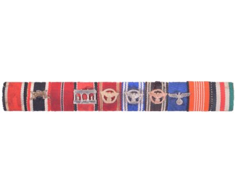 Third Reich Tunic Medal Ribbon Bar, being a ten award example with Iron Cross 2nd class, War Service cross 2nd class with swo