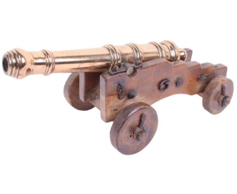 18th Century Model of a Ships Cannon, bronze barrel with turned reinforces, swollen muzzle, the second reinforce engraved wit