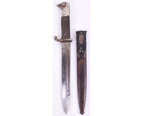 WW2 German Army Parade Bayonet, with black chequered grips and plated top pommel. Housed in its black painted scabbard. Blade