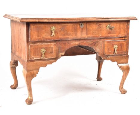 An 18th century walnut Queen Anne inlaid lowboy writing table desk. Raised on cabriole legs with pad feet rising to a low bod