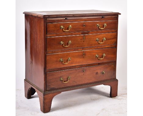 A 19th century Victorian mahogany bachelor's chest of drawers. The chest of drawers having a chamfered edge top over a brush 