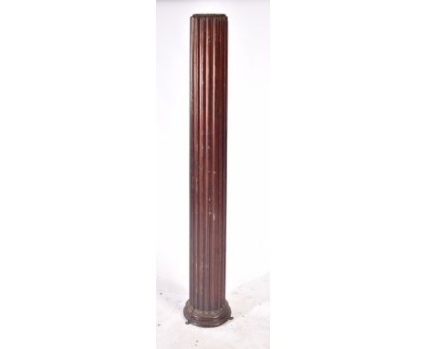 A 19th century Victorian carved mahogany&nbsp;architectural pillar. The pillar of tall form with reeded column raised on a ci