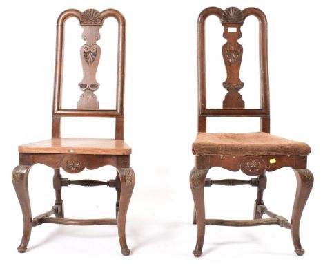 A pair of 17th century oak dining chairs. Raised on cabriole legs united by stretchers. Panel seat to one with upholstered pa