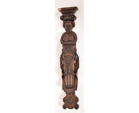 A 20th century carved oak 17th century style figural wall bracket. The carving having a carved face to the top, with tiered c