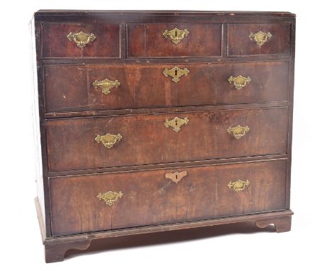 A 18th century George III walnut chest of drawers. The chest having three short over three long graduating drawers. EAch draw