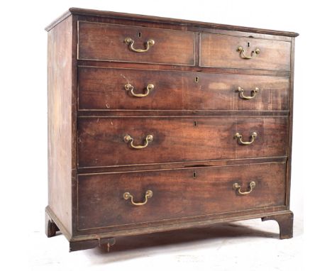 A 19th century Victorian mahogany chest of drawers. The chest having a chamfered edge top over two short and three long drawe