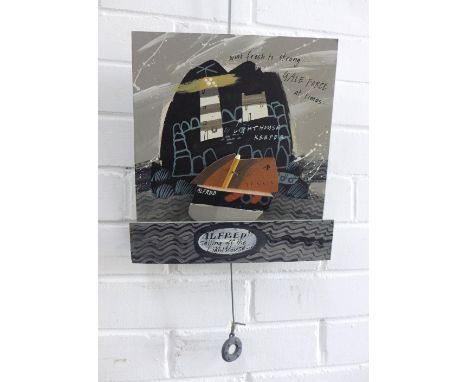JOHN MALTBY (BRITISH 1936-2020)  "ALFRED" SAILING OFF THE LIGHTHOUSE, a weighted automaton of a boat, 25 x 27cm excluding pen