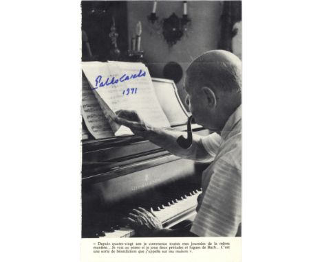 CASALS PABLO: (1876-1973) Spanish Cellist. Signed 5 x 8 book photograph, the image showing Casals, smoking a pipe, seated in 