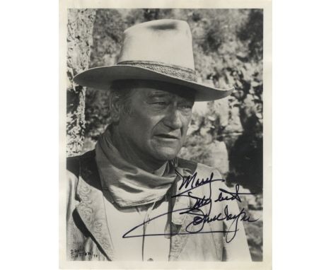 WAYNE JOHN: (1907-1979) American Actor, Academy Award winner. Signed and inscribed 8 x 10 photograph of Wayne in a classic he
