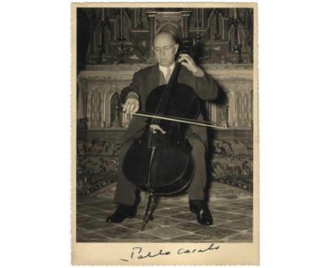 CASALS PABLO: (1876-1973) Spanish Cellist. A good vintage signed 5 x 7 photograph of Casals seated in a full length pose play